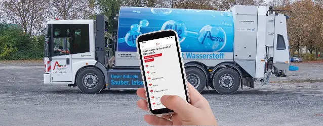 Hand mit Smartphone, Display zeigt Abfuhrtermine